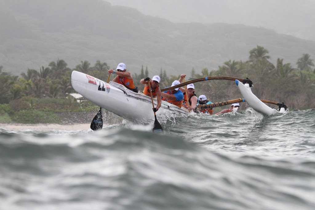 Crew of OC6 paddling on the ocean