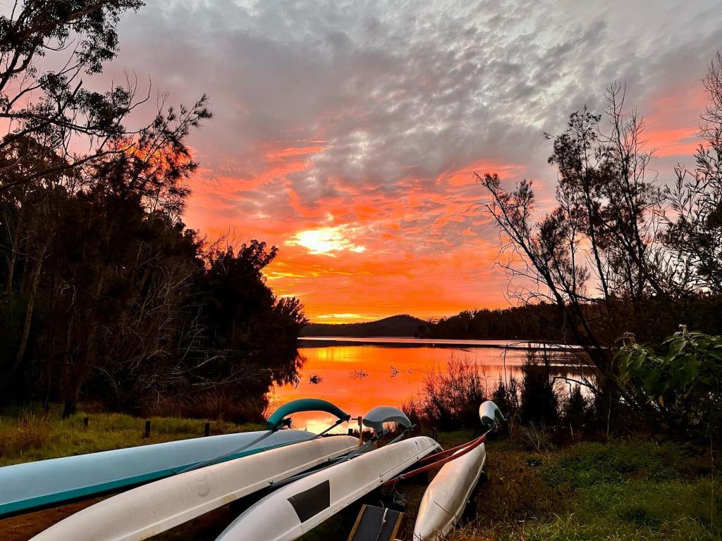 Outrigger canoes at sunrise